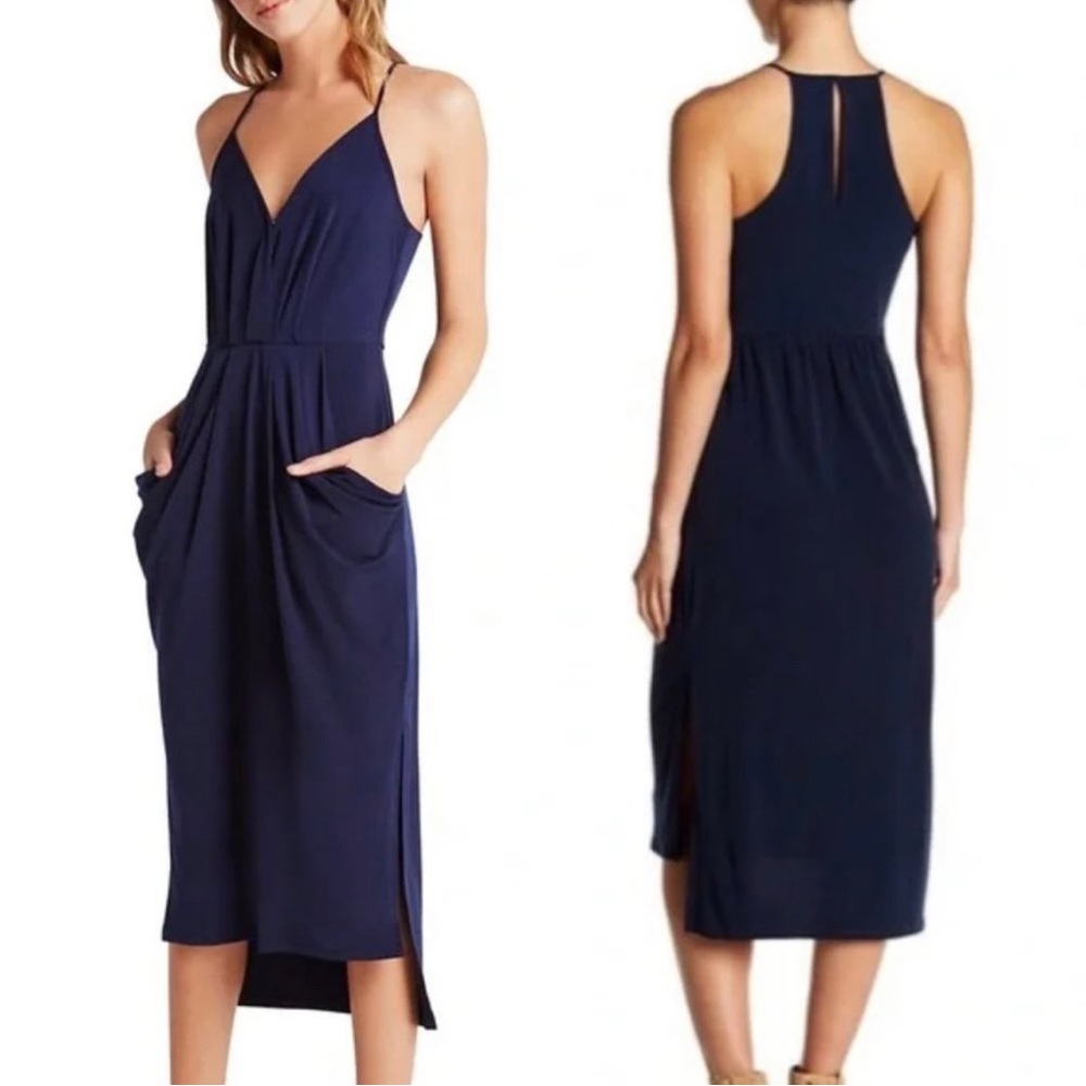 Size M ( but could fit a large) Bcbgeneration racerback navy dress w/ pockets!